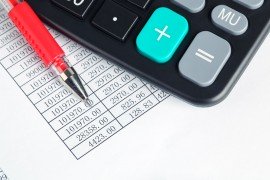 calculator-and-red-pen-PMM7R46